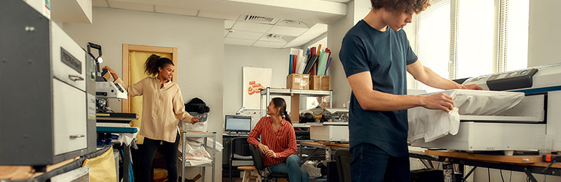 Employees working in backroom