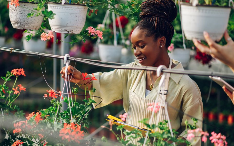 Woman working in gardening store