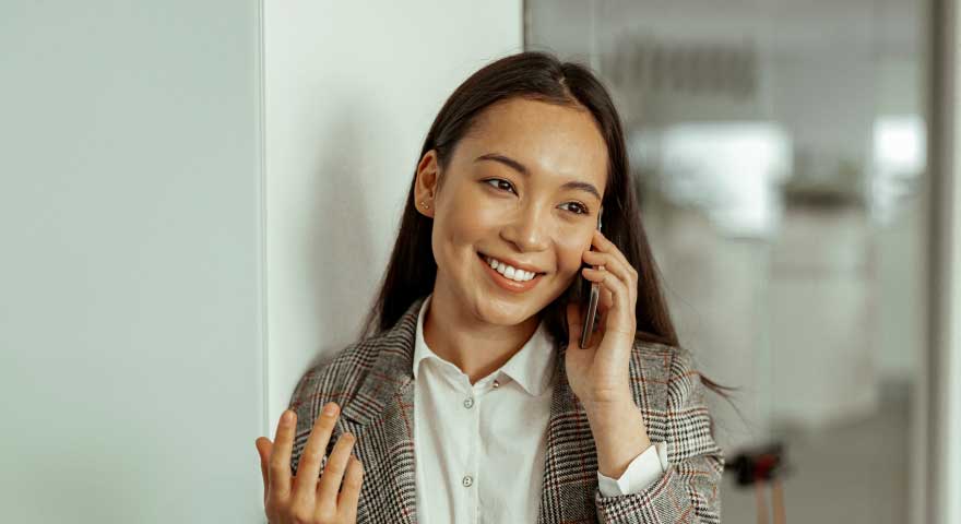 headshot of woman on phone