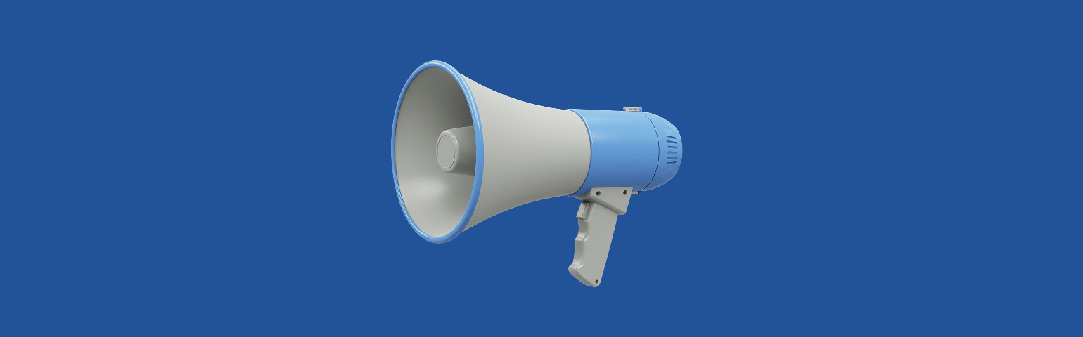 Megaphone on blue background