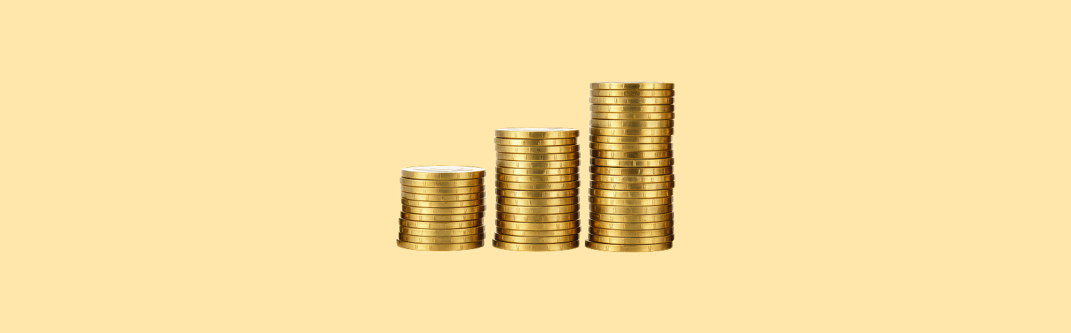 Gold Coins on yellow background