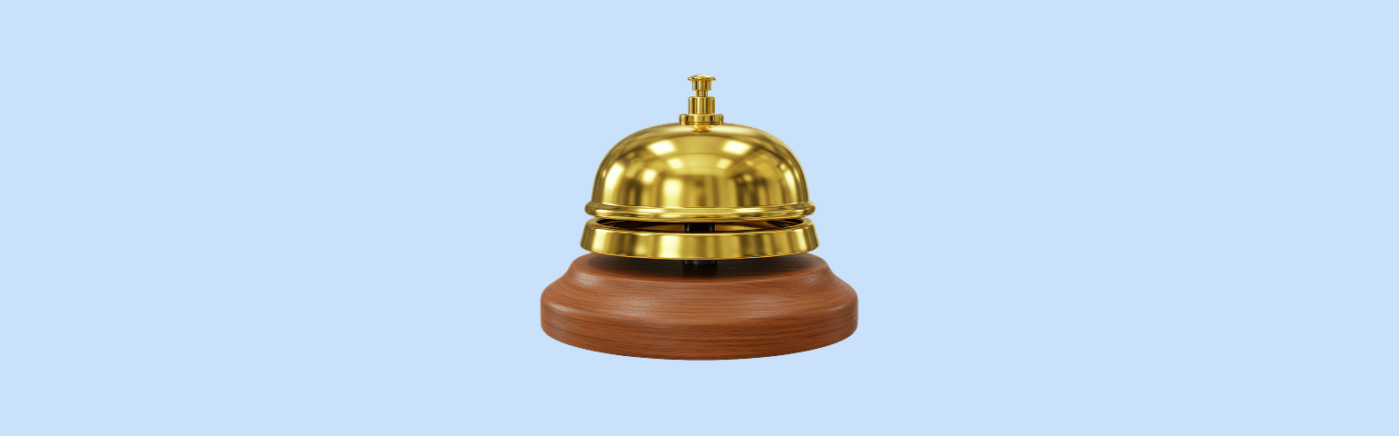 Bell on light blue background