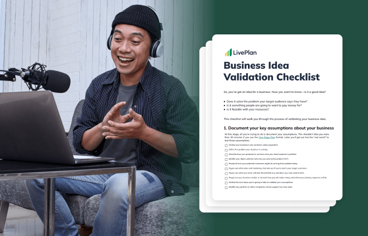 A person wearing headphones smiles while using a laptop. Beside them is a "Business Idea Validation Checklist" on a green background.